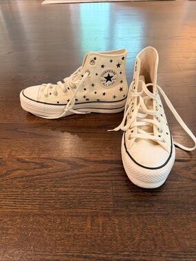 Converse platform White High-Top Canvas Sneakers with Black Star Print